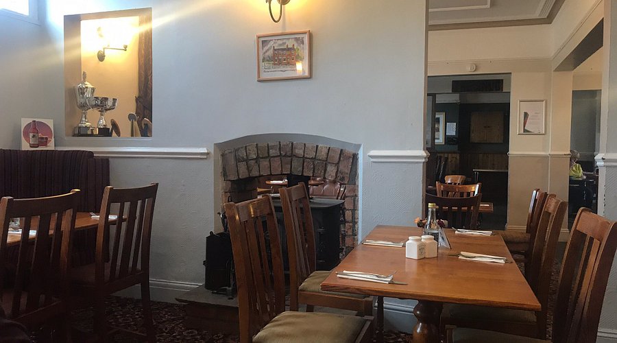 brown wooden table and chairs